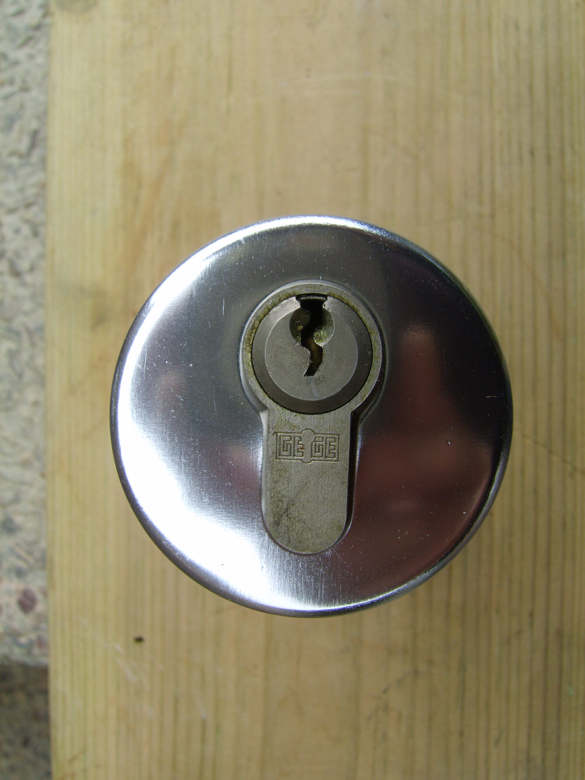 Non B.S. Euro cylinder deadlock fitted by local locksmith in wooden door